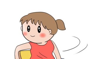 座りながらひねる女性